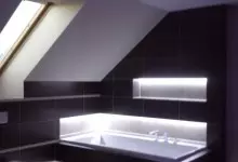 nowoczesna łazienka z czarnymi płytkami